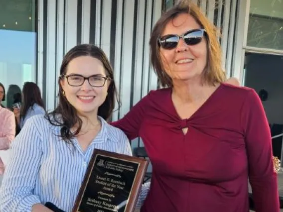 Bethany Kasprzyk receiving 2023 Rombach Student of the Year Award.