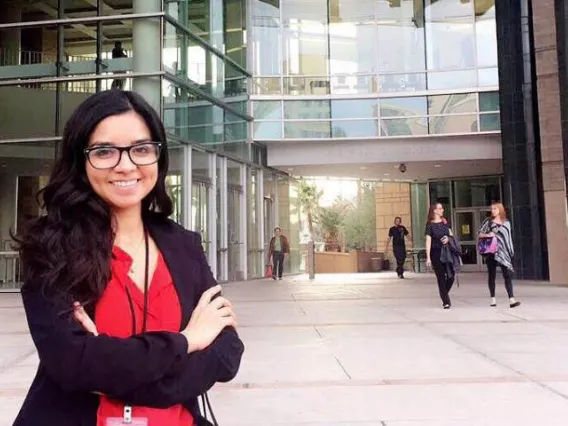 Studet intern in front of government building