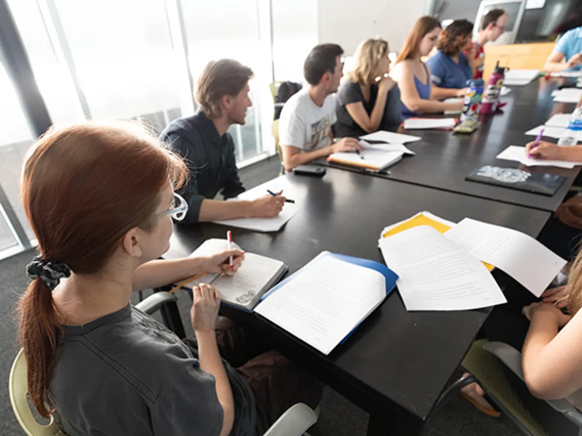 students learning at table