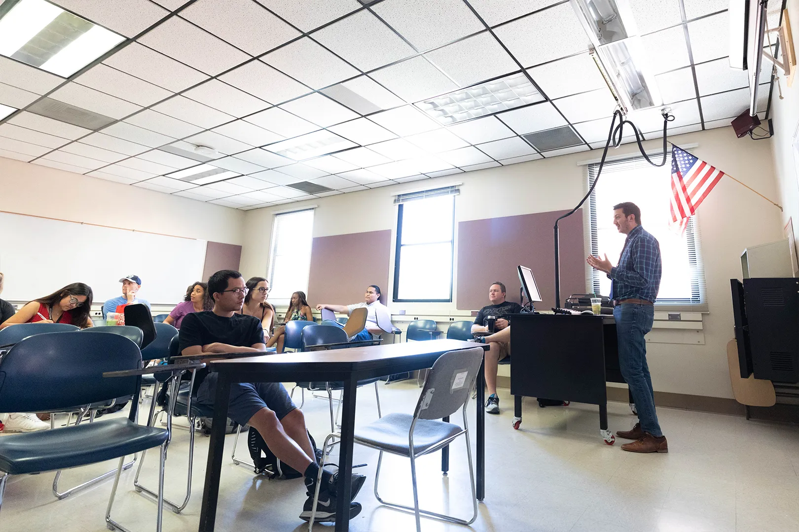 Instructor engaging with his students during a class lecture